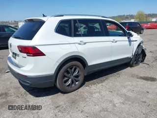 2023 Volkswagen Tiguan SE with VIN 3VVMB7AX4PM128427, listed as a IAAI auction lot 42054477 with 29,731 mi miles and . Bid and sale history available at DreamBid. Image 4.