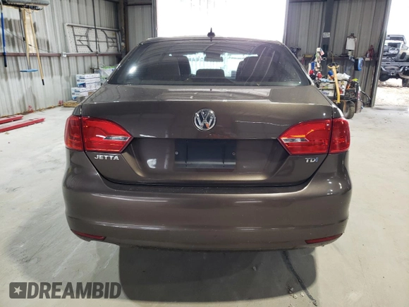 2014 Volkswagen Jetta TDI w/Premium/Nav with VIN 3VWLL7AJ3EM352687, listed as a Copart auction lot 63249725 with 122,678 mi miles and Clean title. Bid and sale history available at DreamBid. Image 6.