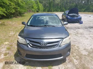2011 Toyota Corolla L with VIN 2T1BU4EE0BC680158, listed as a IAAI auction lot 42060987 with 131,669 mi miles. Bid and sale history available at carsss.com. Image 12.