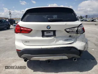 2018 BMW X1 xDrive28i with VIN WBXHT3C35J5L26952, listed as a Copart auction lot 51715035 with 63,306 mi miles and Salvage Title. Bid and sale history available at carsss.com. Image 6.