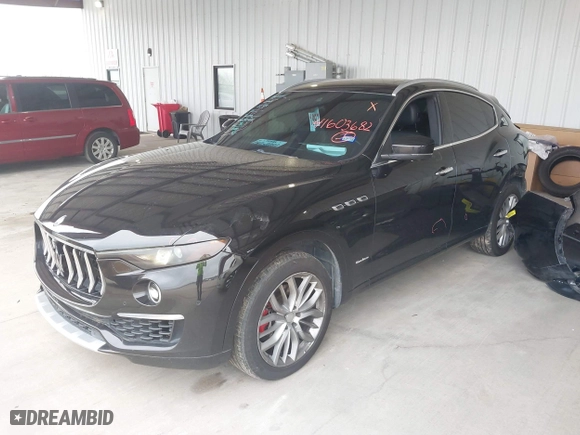 2019 Maserati Levante GranLusso with VIN ZN661XUL4KX321570, listed as a IAAI auction lot 41603682 with 120,085 mi miles. Bid and sale history available at carsss.com. Image 18.