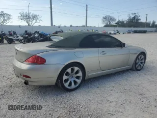 2006 BMW 6 Series 650Ci z VIN WBAEK13406CN72369, wystawiony jako Copart lot #47076175 z przebiegiem 97 684 mil mil oraz Czysty tytuł • Clean title. Historia ofert i sprzedaży dostępna na DreamBid. Obrazek 3.