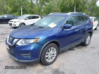 2017 Nissan Rogue SL with VIN 5N1AT2MV9HC874091, listed as a IAAI auction lot 41918485 with 142,185 mi miles. Bid and sale history available at carsss.com. Image 2.