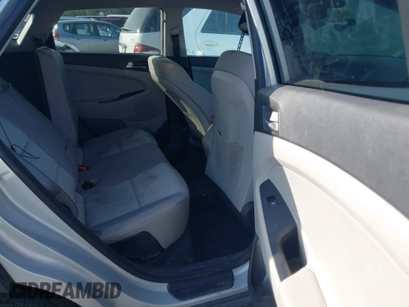 2016 Hyundai Tucson Sport with VIN KM8J33A20GU165154, listed as a IAAI auction lot 41611785 with Not Provided miles. Bid and sale history available at carsss.com. Image 8.