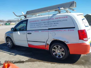 2014 Ram Cargo Van Tradesman with VIN 2C4JRGAG2ER353111, listed as a IAAI auction lot 41667424 with 200,798 mi miles. Bid and sale history available at carsss.com. Image 6.