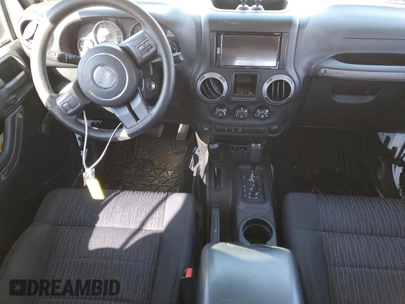 2012 Jeep Wrangler Unlimited Sport with VIN 1C4BJWDG2CL257437, listed as a Copart auction lot 49257965 with 141,695 mi miles and Clean title. Bid and sale history available at DreamBid. Image 8.