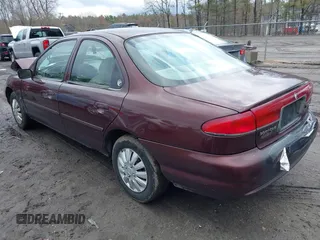 2000 Mercury Mystique GS z VIN 1MEFM6533YK613961, wystawiony jako IAAI lot #41982995 z przebiegiem 83 174 mil mil oraz . Historia ofert i sprzedaży dostępna na DreamBid. Obrazek 3.