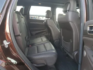 2014 Jeep Grand Cherokee Summit с VIN 1C4RJEJG4EC380074, выставлен на аукционе Copart как лот 64123175 с пробегом 237 803 миль миль и Списание • Salvage title. История ставок и продаж доступна на DreamBid. Изображение 11.