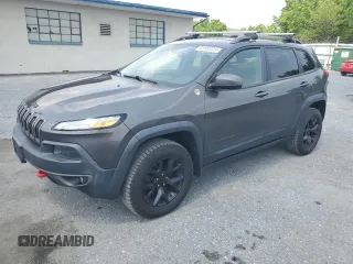 2015 Jeep Cherokee Trailhawk z VIN 1C4PJMBS2FW521809, wystawiony jako Copart lot #61040225 z przebiegiem 89 164 mil mil oraz Czysty tytuł • Clean title. Historia ofert i sprzedaży dostępna na DreamBid. Obrazek 1.