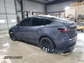 2023 Tesla Model Y Long Range z VIN 7SAYGAEE3PF968231, wystawiony jako Copart lot #45811385 z przebiegiem Nie podano mil oraz Szkoda całkowita • Salvage title. Historia ofert i sprzedaży dostępna na DreamBid. Obrazek 2.