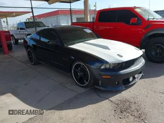 2011 Ford Mustang GT with VIN 1ZVBP8CF0B5107488, listed as a IAAI auction lot 42078619 with 148,171 mi miles. Bid and sale history available at carsss.com. Image 1.