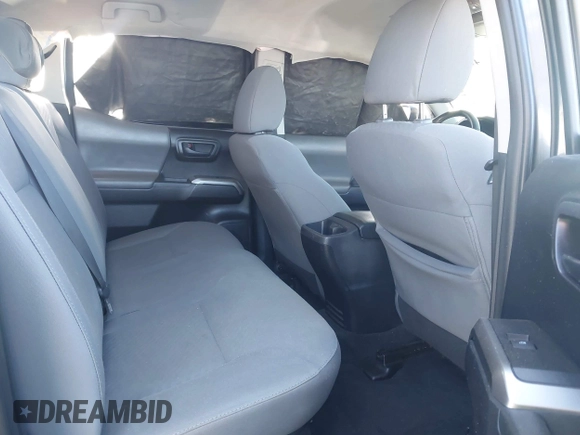 2020 Toyota Tacoma SR5 with VIN 3TMAZ5CN6LM139744, listed as a IAAI auction lot 41690662 with 68,053 mi miles and . Bid and sale history available at DreamBid. Image 8.