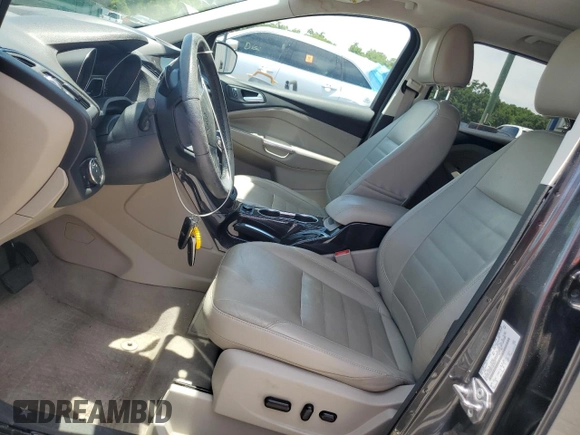2015 Ford Escape Titanium z VIN 1FMCU0J98FUB06577, wystawiony jako Copart lot #61341175 z przebiegiem 66 206 mil mil oraz Szkoda całkowita • Salvage title. Historia ofert i sprzedaży dostępna na DreamBid. Obrazek 7.