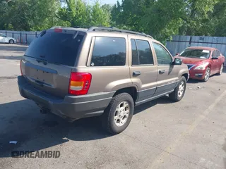 2001 Jeep Grand Cherokee Laredo with VIN 1J4GW48S81C694537, listed as a IAAI auction lot 42447828 with 162,981 mi miles and . Bid and sale history available at DreamBid. Image 4.