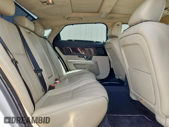 2015 Jaguar XJ Portfolio with VIN SAJWA2GZ7F8V82990, listed as a Copart auction lot 63325535 with 113,892 mi miles and Salvage title. Bid and sale history available at DreamBid. Image 10.