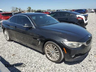 2014 BMW 4 Series 435i with VIN WBA3T3C52EJ877147, listed as a Copart auction lot 53008705 with Not provided miles and Salvage title. Bid and sale history available at DreamBid. Image 4.