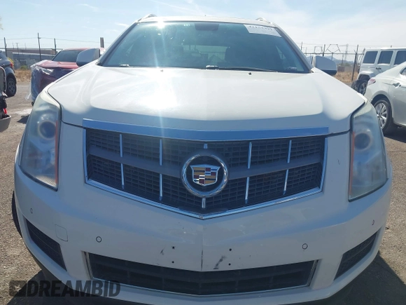 2012 Cadillac SRX Luxury Collection z VIN 3GYFNAE32CS518428, wystawiony jako IAAI lot #42153391 z przebiegiem 159 836 mil mil oraz . Historia ofert i sprzedaży dostępna na DreamBid. Obrazek 13.