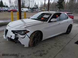 2018 Alfa Romeo Giulia Ti with VIN ZARFAECNXJ7574745, listed as a IAAI auction lot 41809543 with 69,372 mi miles. Bid and sale history available at carsss.com. Image 2.