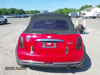 2005 MINI Convertible with VIN WMWRF33445TF62043, listed as a IAAI auction lot 42279363 with 173,067 mi miles and . Bid and sale history available at DreamBid. Image 16.
