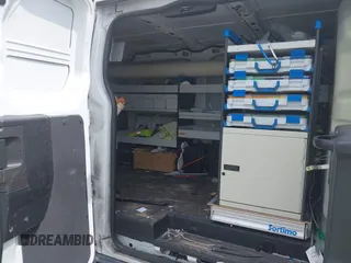 2015 Ford Transit Cargo z VIN 1FTNR1ZMXFKA45161, wystawiony jako IAAI lot #42181449 z przebiegiem 130 096 mil mil oraz . Historia ofert i sprzedaży dostępna na DreamBid. Obrazek 8.