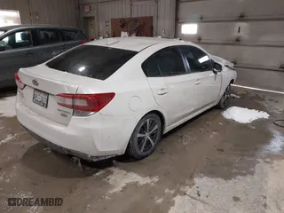 2019 Subaru Impreza Premium with VIN 4S3GKAD63K3612319, listed as a IAAI auction lot 41608265 with 120,000 mi miles. Bid and sale history available at carsss.com. Image 4.