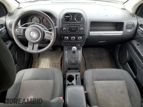 2016 Jeep Compass Sport with VIN 1C4NJDBB3GD520141, listed as a Copart auction lot 56902885 with 147,154 mi miles and Salvage title. Bid and sale history available at DreamBid. Image 8.