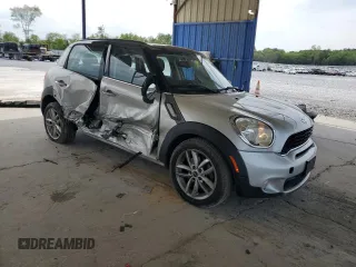 2014 MINI Countryman S with VIN WMWZC3C56EWP29211, listed as a Copart auction lot 52521145 with 91,396 mi miles and Salvage title. Bid and sale history available at DreamBid. Image 4.
