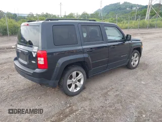 2014 Jeep Patriot Latitude with VIN 1C4NJRFB0ED641875, listed as a IAAI auction lot 42447186 with 137,499 mi miles and . Bid and sale history available at DreamBid. Image 4.