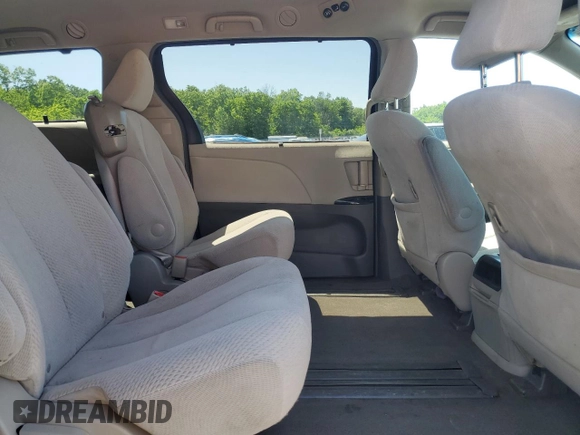 2012 Toyota Sienna LE AAS с VIN 5TDKK3DC8CS223994, выставлен на аукционе Copart как лот 58837905 с пробегом 190 814 миль миль и Списание • Salvage title. История ставок и продаж доступна на DreamBid. Изображение 11.
