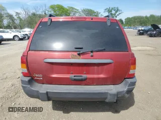 2004 Jeep Grand Cherokee Laredo z VIN 1J4GW48S24C220989, wystawiony jako Copart lot #56759465 z przebiegiem 227 612 mil mil oraz Szkoda całkowita • Salvage title. Historia ofert i sprzedaży dostępna na DreamBid. Obrazek 6.