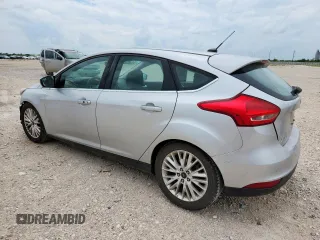 2017 Ford Focus Titanium with VIN 1FADP3N28HL346418, listed as a Copart auction lot 63507125 with 107,761 mi miles and Salvage title. Bid and sale history available at DreamBid. Image 2.