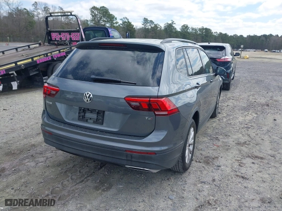 2018 Volkswagen Tiguan S with VIN 3VV1B7AX9JM088226, listed as a IAAI auction lot 41804141 with 68,026 mi miles. Bid and sale history available at carsss.com. Image 4.
