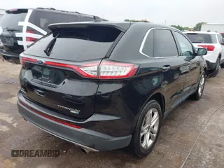 2015 Ford Edge Titanium z VIN 2FMTK4K96FBB24674, wystawiony jako IAAI lot #42403892 z przebiegiem 113 816 mil mil oraz . Historia ofert i sprzedaży dostępna na DreamBid. Obrazek 4.