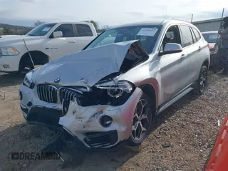 2019 BMW X1 sDrive28i with VIN WBXHU7C52K3H44360, listed as a IAAI auction lot 41709431 with 56,432 mi miles. Bid and sale history available at carsss.com. Image 2.