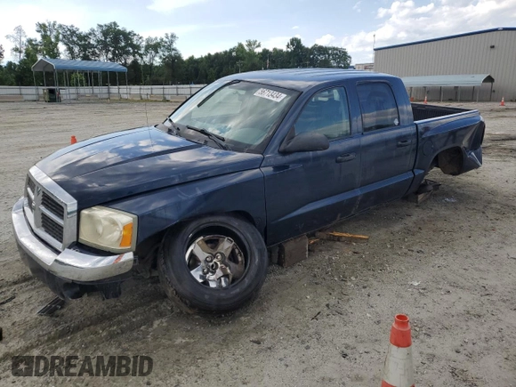 2005 Dodge Dakota SLT with VIN 1D7HE48NX5S308595, listed as a Copart auction lot 56713434 with 257,419 mi miles and Salvage Title. Bid and sale history available at DreamBid. Image 1.