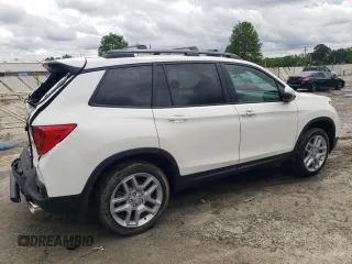 2024 Honda Passport EX-L z VIN 5FNYF8H50RB023552, wystawiony jako Copart lot #58101325 z przebiegiem 573 mil mil oraz Tytuł czysty. Historia ofert i sprzedaży dostępna na DreamBid. Obrazek 3.