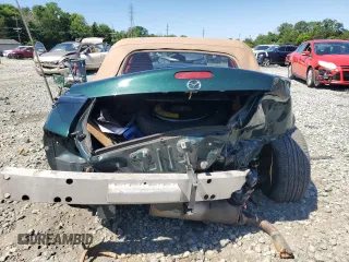 2001 Mazda MX-5 Miata with VIN JM1NB353410203639, listed as a Copart auction lot 56447414 with 131,520 mi miles and Salvage Title. Bid and sale history available at DreamBid. Image 6.