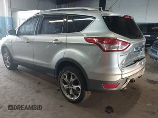 2015 Ford Escape Titanium z VIN 1FMCU9J96FUB23902, wystawiony jako IAAI lot #42497188 z przebiegiem 164 452 mil mil oraz . Historia ofert i sprzedaży dostępna na DreamBid. Obrazek 3.