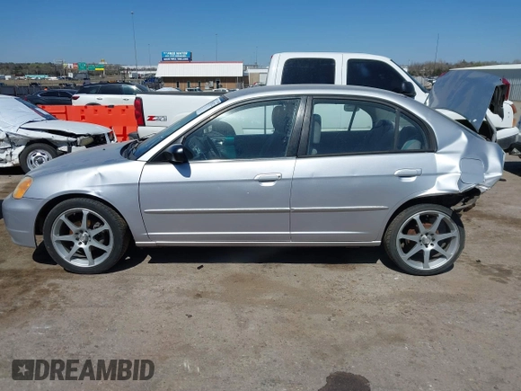 2002 Honda Civic LX with VIN 1HGES15562L039463, listed as a IAAI auction lot 41851232 with 173,411 mi miles. Bid and sale history available at carsss.com. Image 14.
