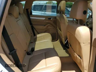 2014 Porsche Cayenne GTS с VIN WP1AD2A27ELA70118, выставлен на аукционе Copart как лот 56405945 с пробегом 179 529 миль миль и Списание • Salvage title. История ставок и продаж доступна на DreamBid. Изображение 11.
