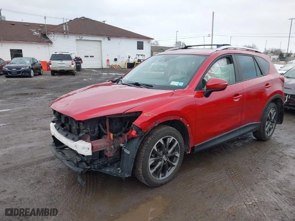 2016 Mazda CX-5 Grand Touring with VIN JM3KE4DYXG0668830, listed as a IAAI auction lot 41738187 with NaN miles. Bid and sale history available at carsss.com. Image 18.