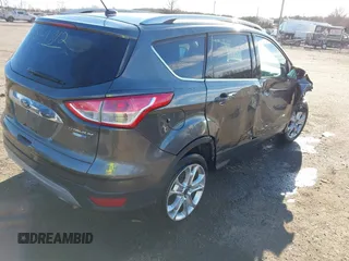 2016 Ford Escape Titanium с VIN 1FMCU9J91GUA72102, выставлен на аукционе IAAI как лот 41641812 с пробегом 166 688 миль миль и . История ставок и продаж доступна на DreamBid. Изображение 4.