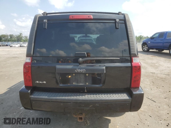 2009 Jeep Commander Sport z VIN 1J8HG48K39C501268, wystawiony jako Copart lot #64312325 z przebiegiem 184 794 mil mil oraz Szkoda całkowita • Salvage title. Historia ofert i sprzedaży dostępna na DreamBid. Obrazek 6.