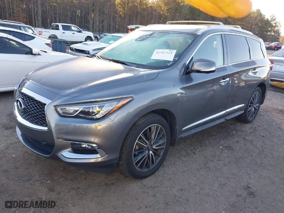 2020 Infiniti QX60 LUXE with VIN 5N1DL0MMXLC506990, listed as a IAAI auction lot 41307122 with 83,657 mi miles. Bid and sale history available at carsss.com. Image 2.