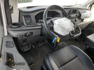 2023 Ford Transit Cargo with VIN 1FTBR2C8XPKA42105, listed as a Copart auction lot 80028384 with 136,464 mi miles and Salvage title. Bid and sale history available at DreamBid. Image 8.