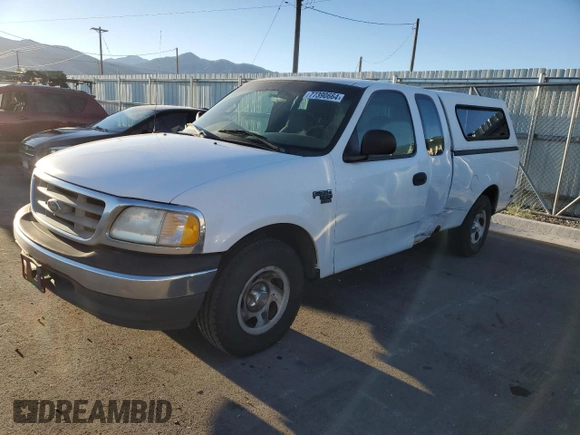 2000 Ford F-150 with VIN 1FTRX17W8YKB11043, listed as a Copart auction lot 77390664 with 181,439 mi miles and Salvage Title. Bid and sale history available at DreamBid. Image 1.