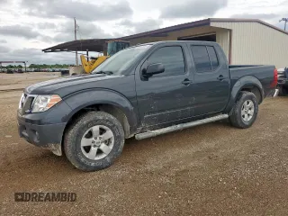 2013 Nissan Frontier SL with VIN 1N6AD0ER5DN735577, listed as a Copart auction lot 60412235 with 77,376 mi miles and Salvage title. Bid and sale history available at DreamBid. Image 1.
