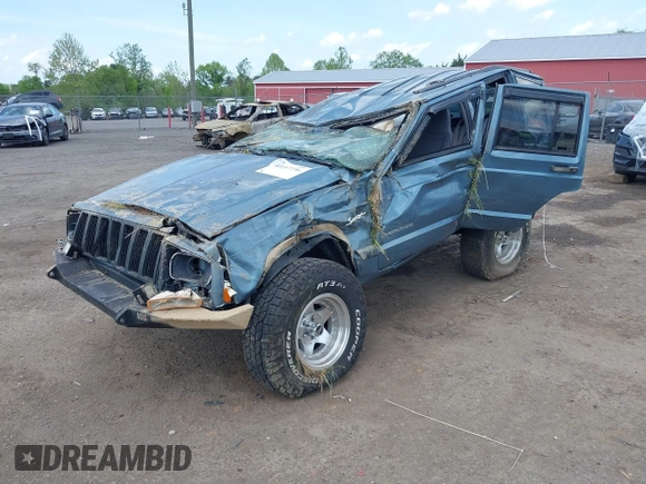 1997 Jeep Cherokee Sport with VIN 1J4FJ68S8VL557562, listed as a IAAI auction lot 42157736 with Not provided miles and . Bid and sale history available at DreamBid. Image 2.