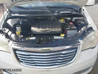 2013 Chrysler Town & Country Touring with VIN 2C4RC1BG2DR620651, listed as a IAAI auction lot 41895163 with 183,385 mi miles. Bid and sale history available at carsss.com. Image 10.