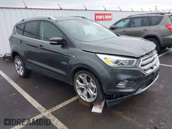 2019 Ford Escape Titanium with VIN 1FMCU9J99KUA64158, listed as a IAAI auction lot 41980102 with 52,514 mi miles. Bid and sale history available at carsss.com. Image 1.